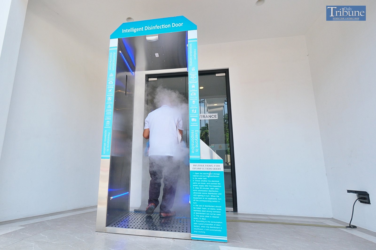 TRIBUNE-coviddisinfectiondoor